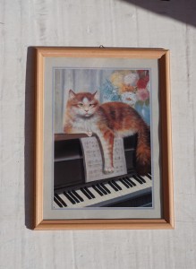 Kot na pianinie obraz druk vintage